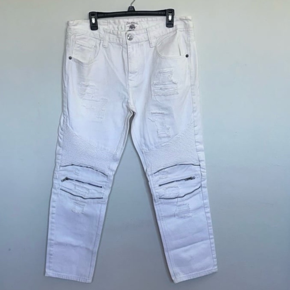 White Skinny Jeans with Distressed Details
